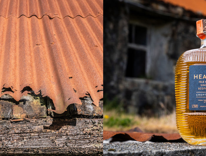 Bottle of Hearach whisky on a rustic background